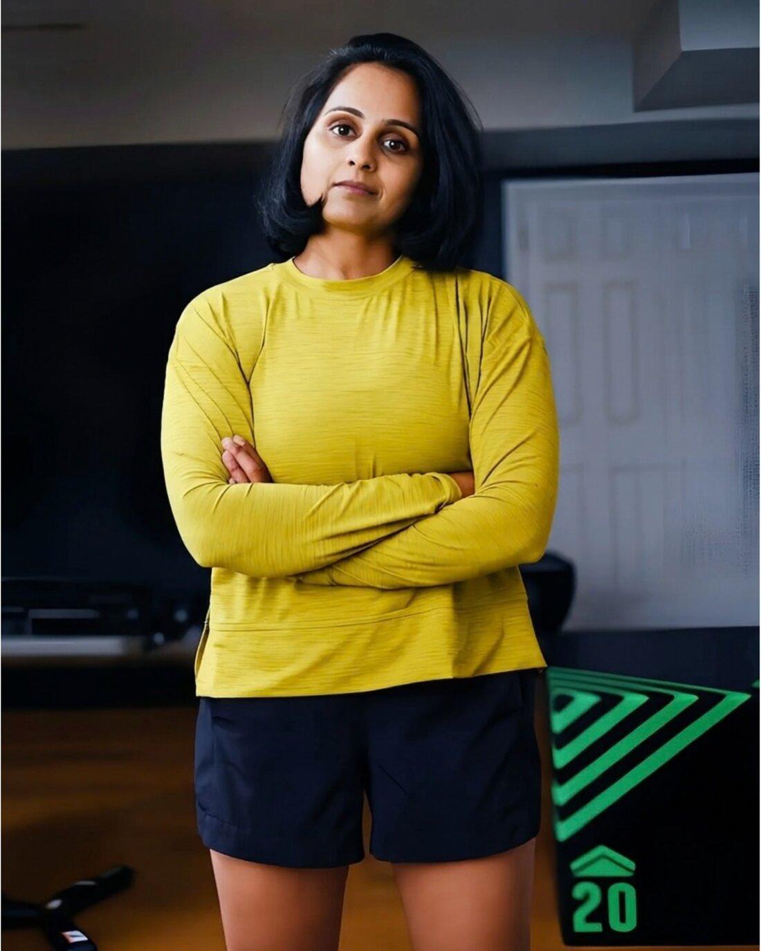 Geeta Bihari standing confidently in her training space